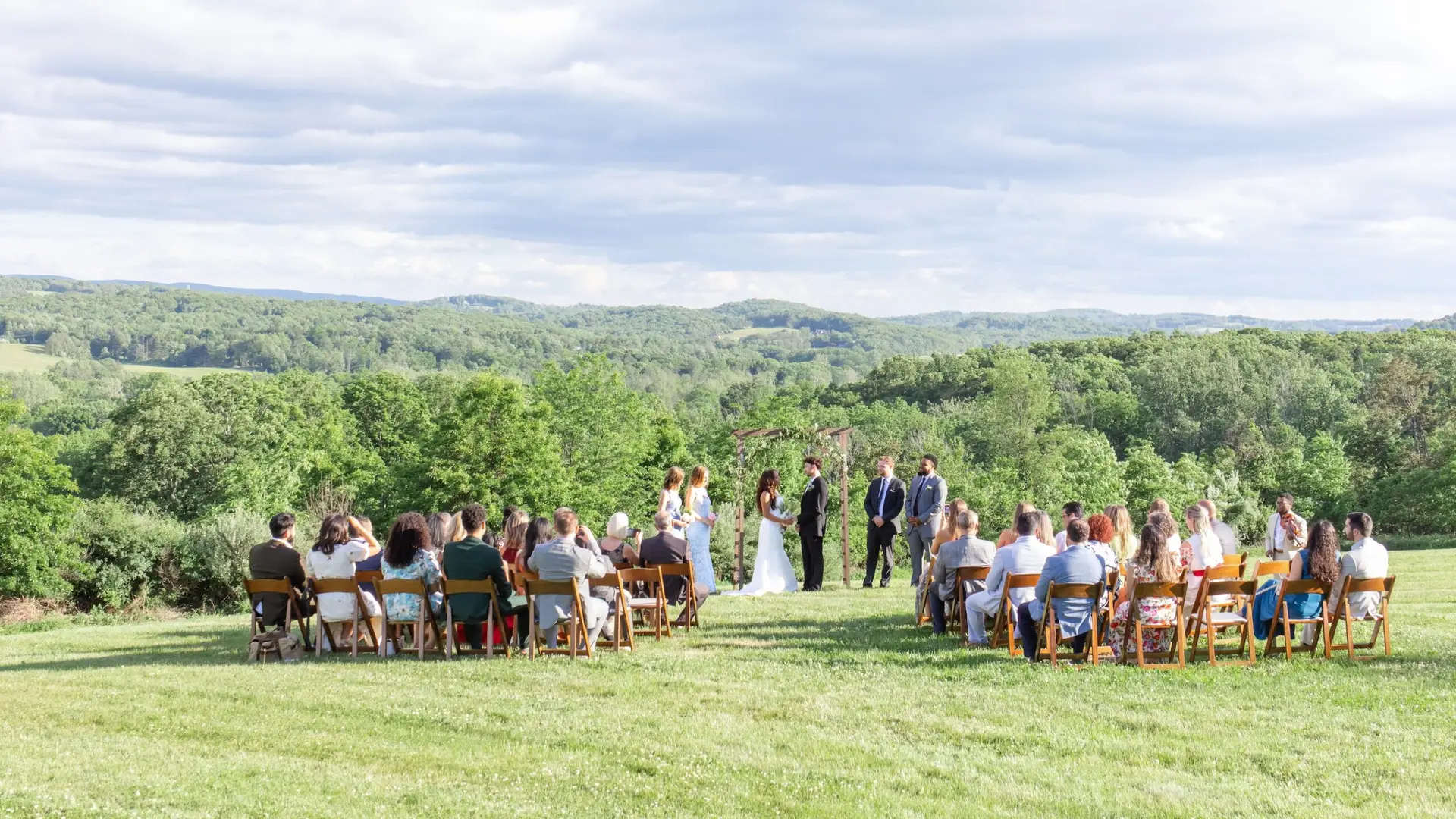 Outdoor wedding ceremony overlooking the valley at The Maple Overlook