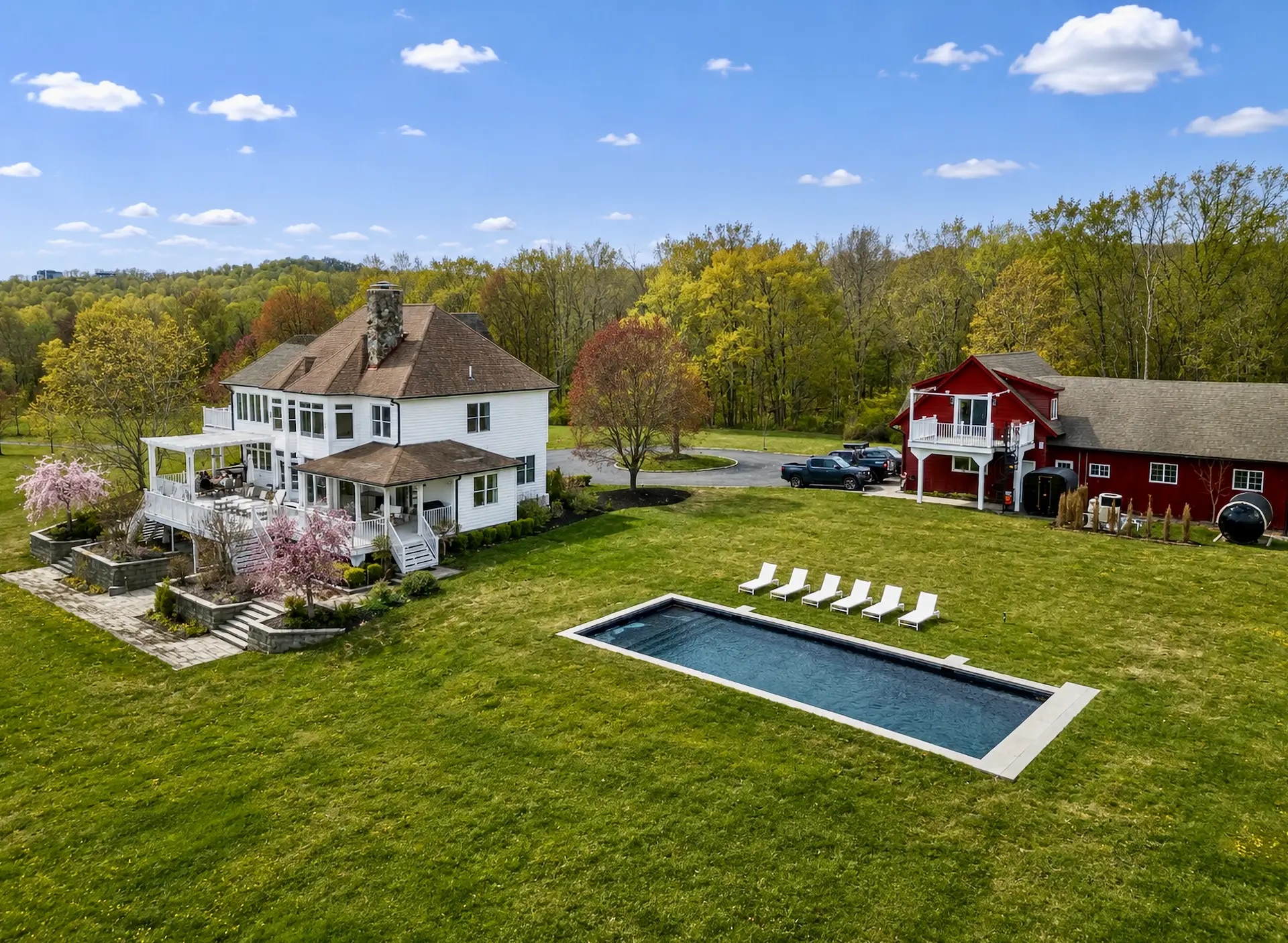 Aerial view of The Maple Overlook with the main house, pool, barn and surrounding grounds